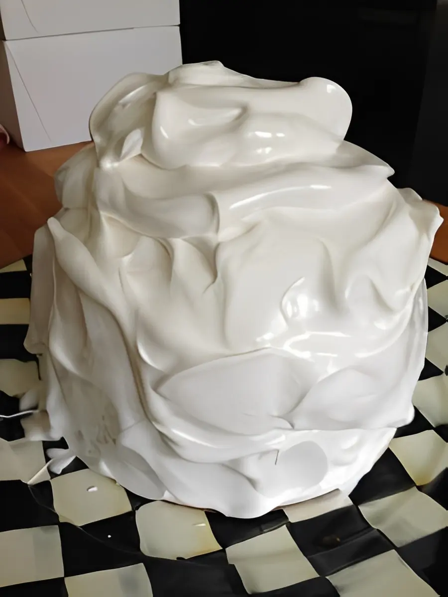 Fluffy white cake with glossy icing
