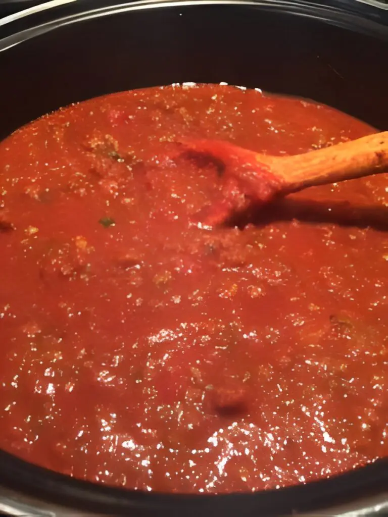 Cooking tomato sauce in a pot