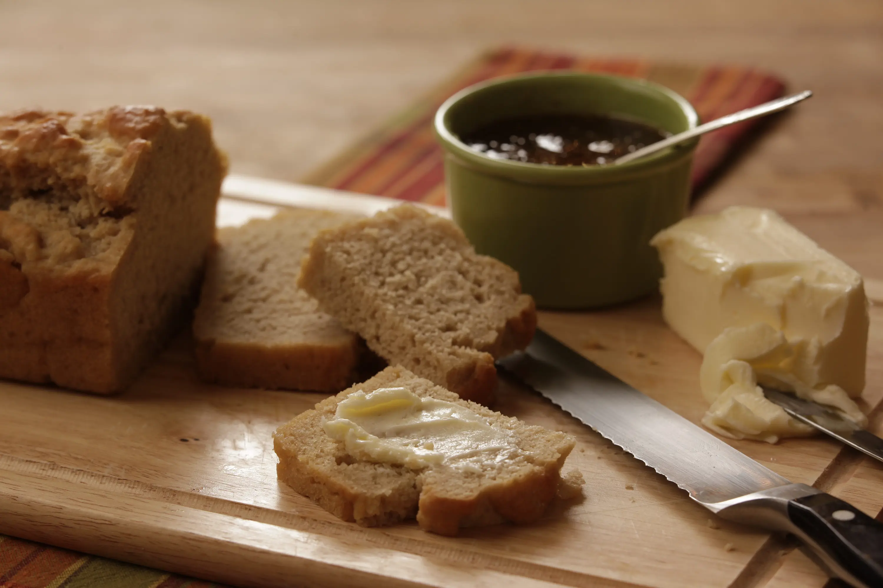 Sliced bread on wooden board