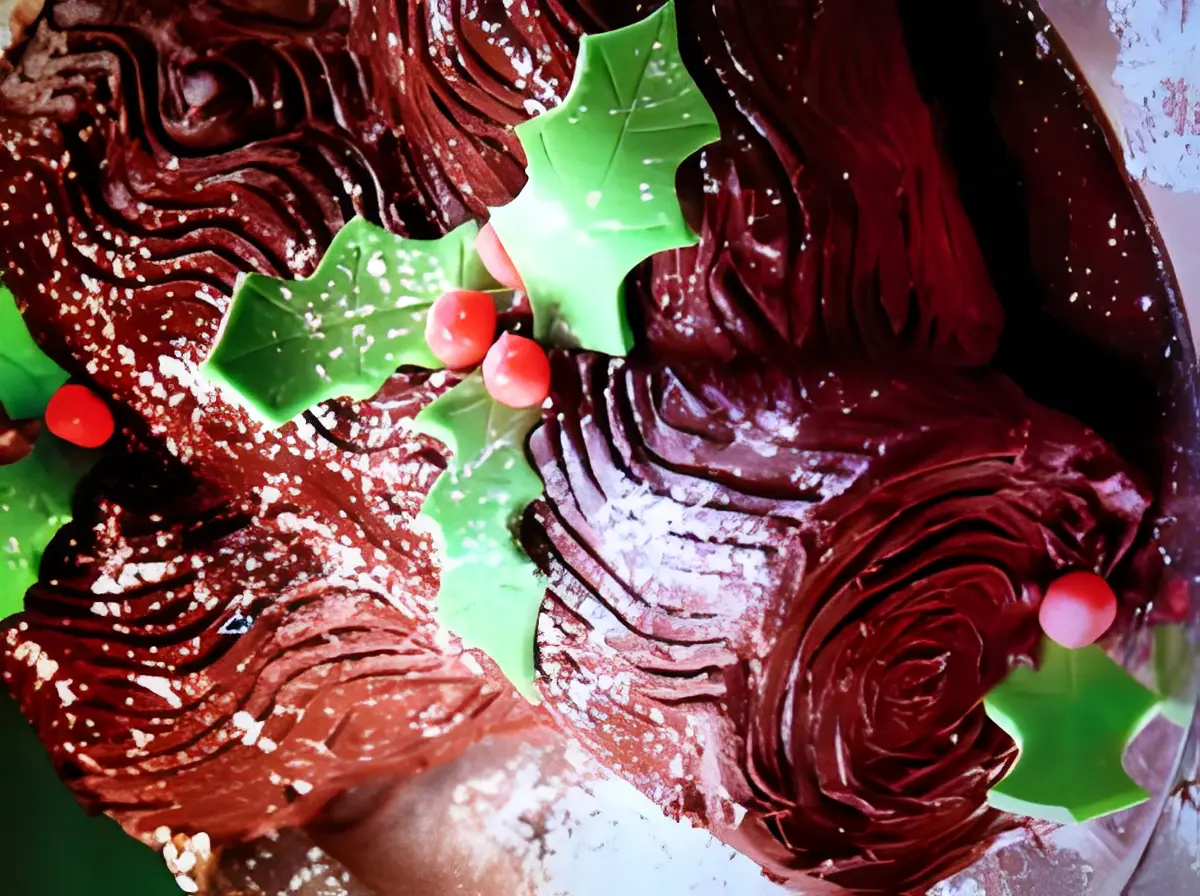 Chocolate yule log with holly decoration